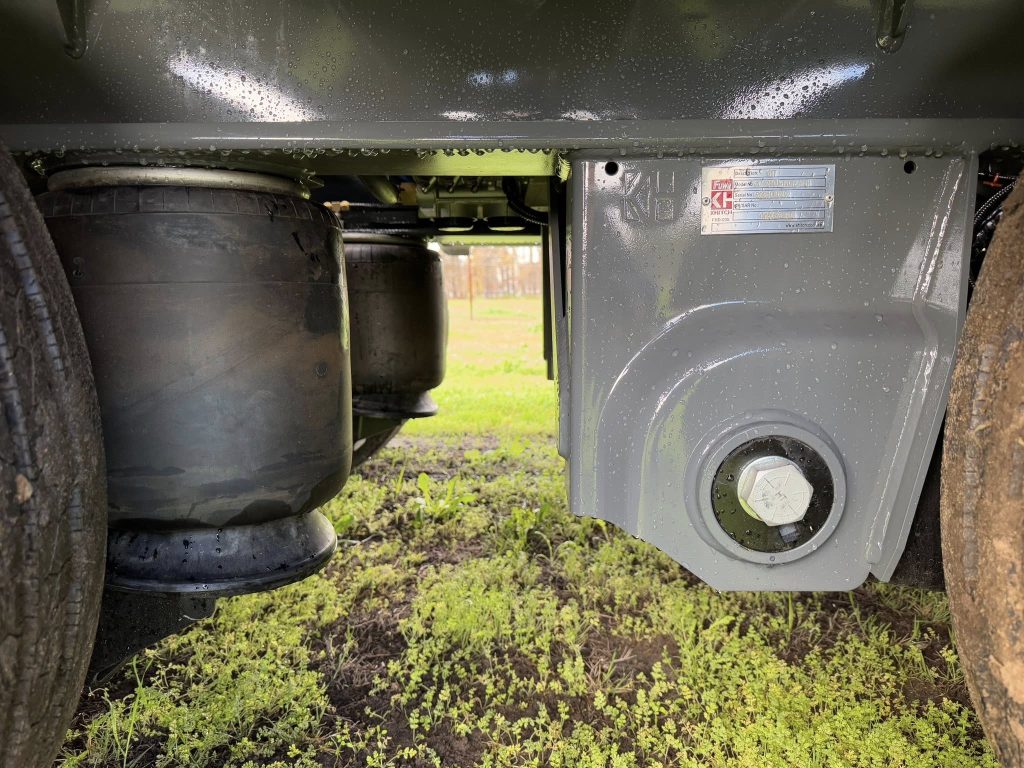 Close-up of the FreightWest drop deck steel platform surface showing recessed tie-down points and deck detailing