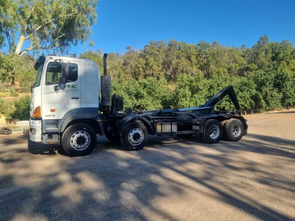 Hino 700 Model 3213 tipper truck rear angle