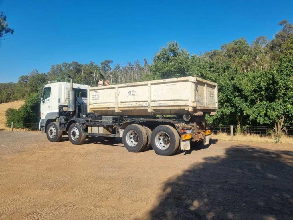 Hino 700 Model 3213 hook lift chassis side view
