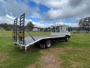 Isuzu FRR500 beavertail truck side view