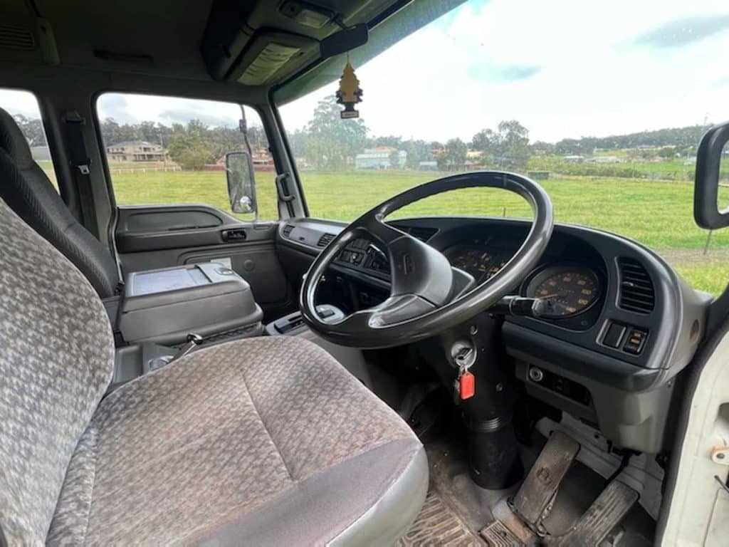 Isuzu FRR500 cab interior and steering wheel