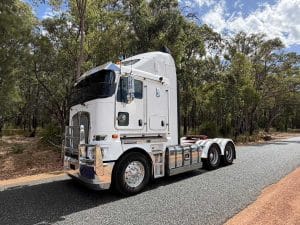 Kenworth K200 6x4 prime mover side view