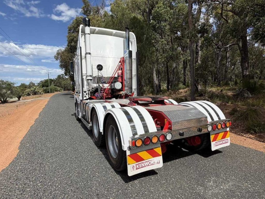 Kenworth K200 6x4 prime mover rear side view